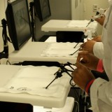 HCOP students practice Laparoscopic techniques on July 25, 2012. Photo by Matthew Maron