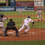 Running for First James McOwen of the Long Island Duck's running towards first base on July 24, 2012 at Bethpage Ballpark in East Islip, New York. Photo by Alexandra Henaghan
